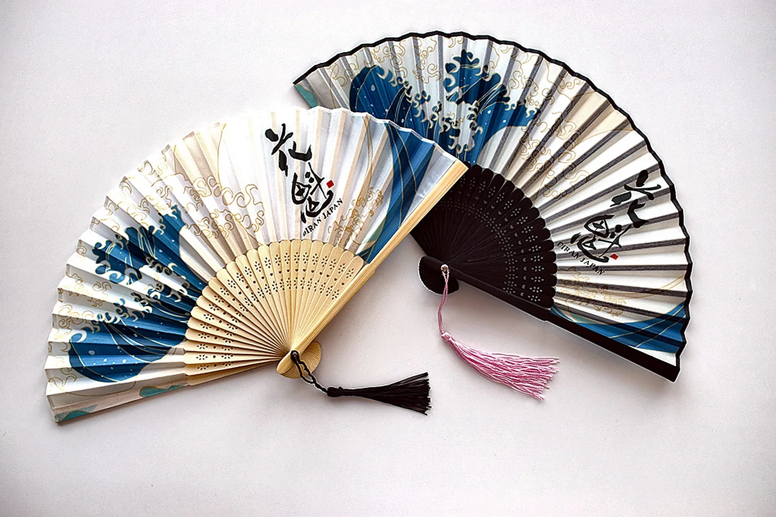 Japanese folding fan (sensu) with original OIRAN JAPAN artwork, shown open